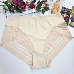 Majtki laserowo cięte z siateczką plus size wysoki stan Odette cielisty