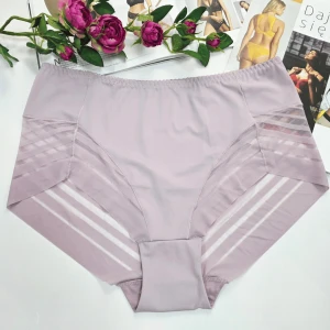 Majtki laserowo cięte z siateczką plus size wysoki stan Odette pudrowy